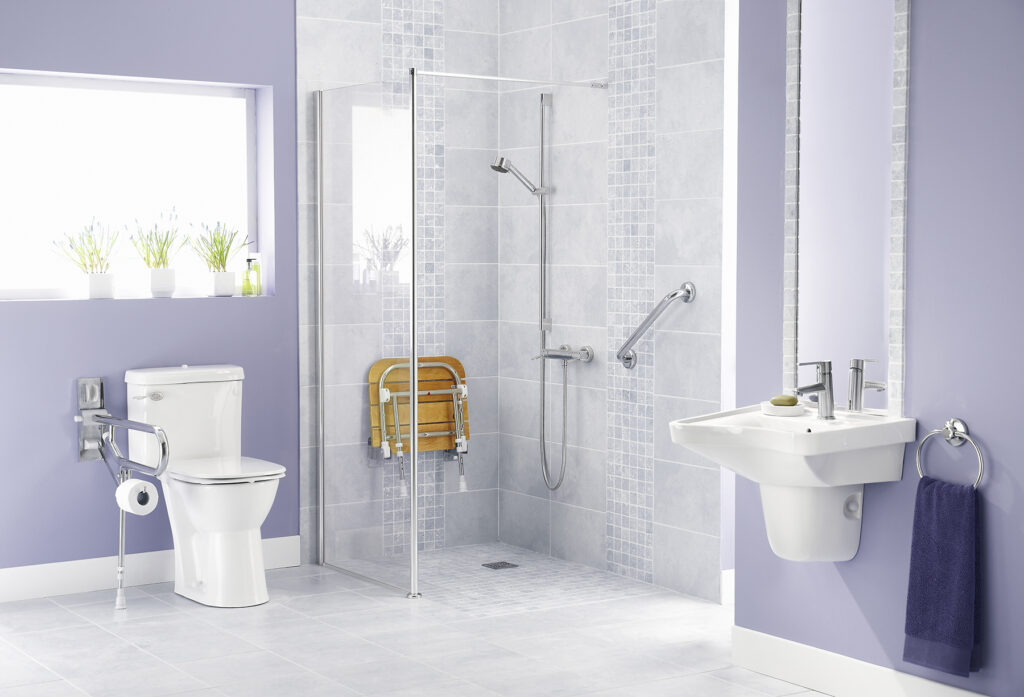 lilac painted walls in bathroom featuring accessibility solutions including grab bars and walk-in/roll-in shower with seat